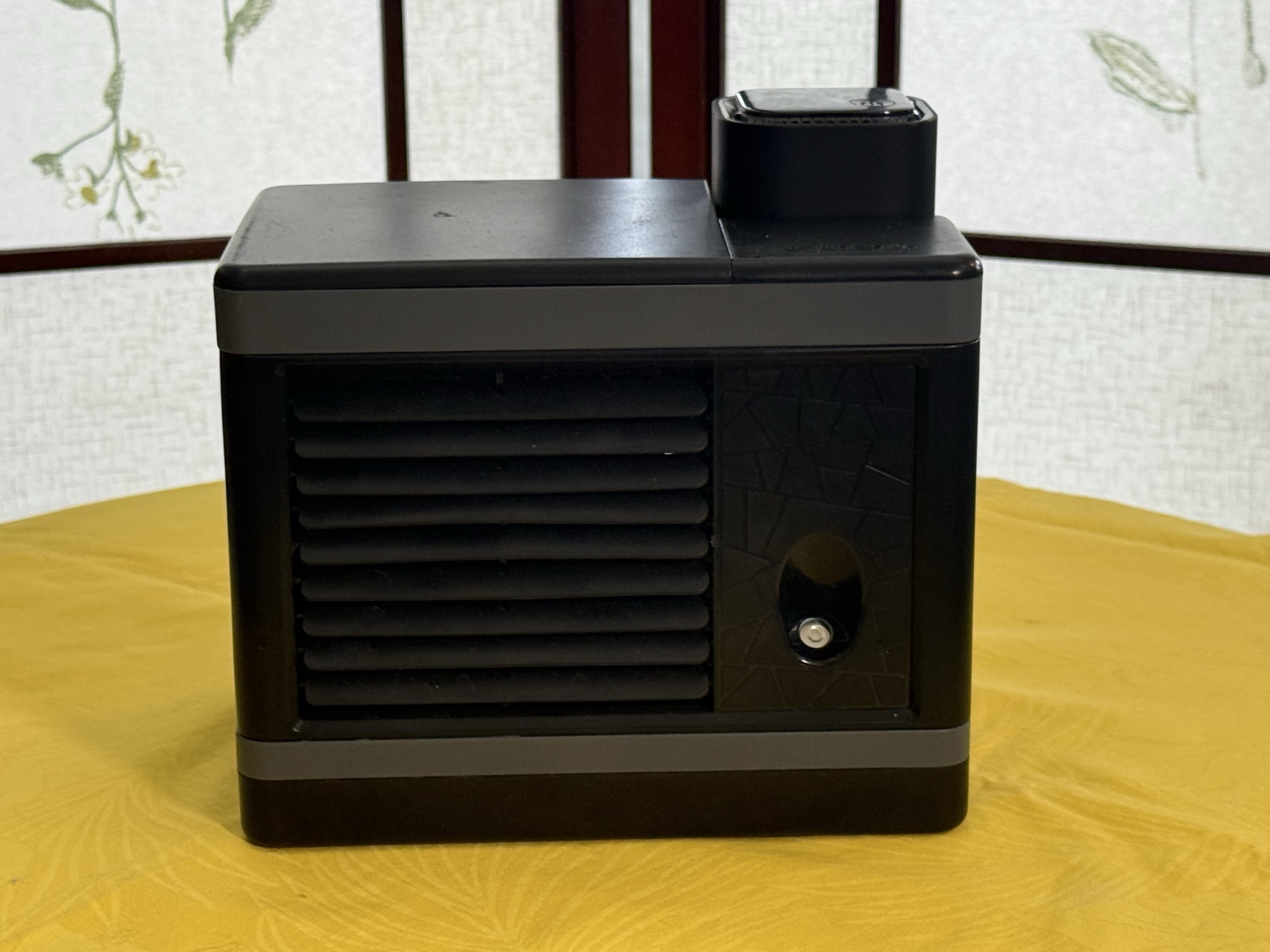 Front view of the compact Kool Skools desk-side cooling unit.
